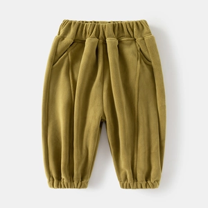 Detailed close-up of warm olive polar fleece kids trousers with elastic waist and stitched seam