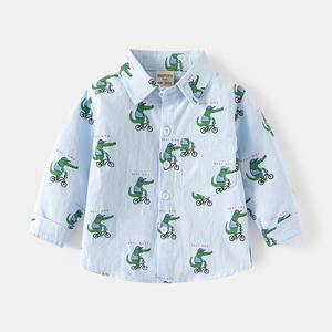 Camicia bimbo celeste in cotone a maniche lunghe con stampa coccodrilli in bici