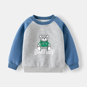 Close-up of ribbed neckline and sleeve cuffs on a cartoon bear long sleeve sweatshirt