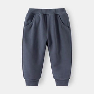 Detailed close-up of dark grey-blue kids' cotton jogger pants with ribbed waistband