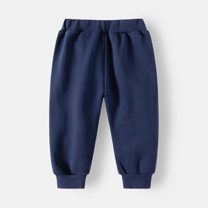 Detail of navy blue kids sweatpants with elastic waist and ribbed cuffs for boys