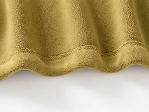 Close-up of thick fleece fabric texture and double-stitch hem on kids' loungewear