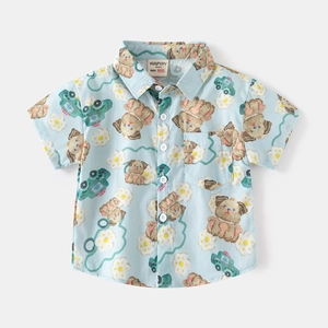 Detail of boys' light blue shirt collar with cartoon puppy and car digital print