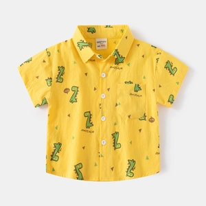 Short sleeve yellow kids shirt featuring colorful cartoon dinosaur prints and turn-down collar