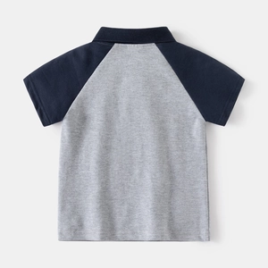 Back view of boys short-sleeved polo shirt with contrast color collar and grey cotton body