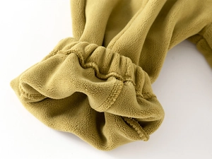 Detailed macro view of fleece sleeve cuffs with durable elastic stitching and soft texture
