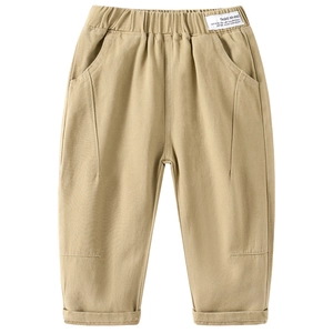 Classic khaki kids' cotton trousers featuring elastic waist and stylish letter patch