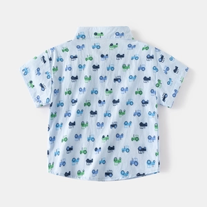 Back view of boys light blue short sleeve shirt with colorful cartoon tractor print