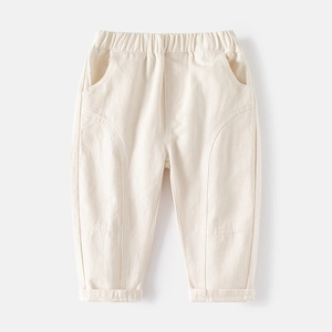 Pantalon décontracté beige pour enfant avec taille élastique et coutures décoratives