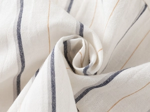 Close-up of soft striped cotton fabric with breathable texture for kids' shirts