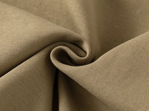Close-up detail of high-quality khaki knitted fabric with premium diagonal weave texture