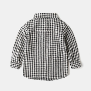 Back view of children's long-sleeve black and white gingham checkered cotton shirt