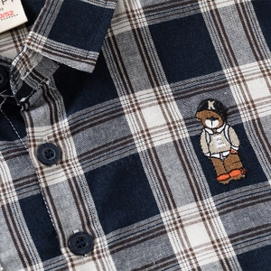 Boys long sleeve blue and brown plaid cotton shirt with bear embroidery detail