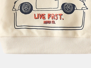 Detail of ribbed hem and vintage car print on beige cotton sweatshirt for boys