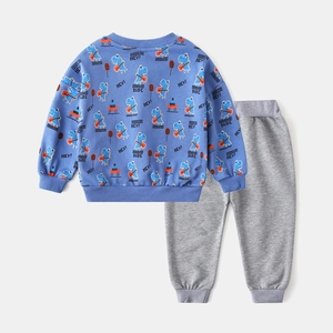 Close-up of blue sweatshirt with dinosaur guitar print and matching gray joggers