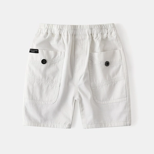White cotton canvas casual shorts for boys featuring elastic waist and large side pockets