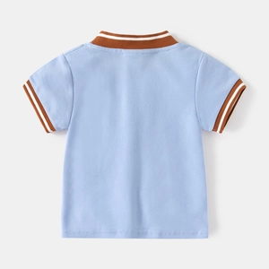 Detailed back view of light blue children's polo shirt with striped ribbed collar and cuffs