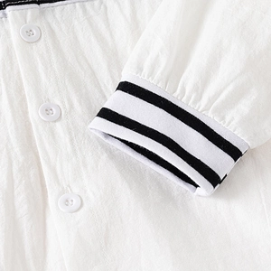 White long sleeve boys' shirt with striped rib cuffs and button-down collar details