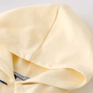 Kids hooded sweatshirt in soft beige cotton fabric with premium navy inner neck stitching