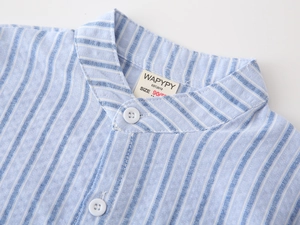 Close-up of blue and white striped shirt collar with Mandarin neck and white button