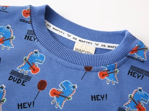 Detail of blue cartoon dinosaur sweatshirt neckline with ribbed collar and knit texture