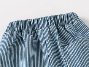 Detail of boys vertical striped shorts with elastic waistband and back pocket