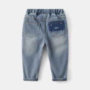 Back view of light blue boys' denim jeans with elastic waist and printed back pockets