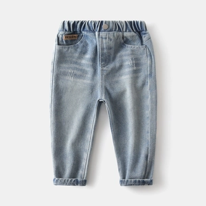 Classic light blue washed boys denim jeans with elastic waistband and distressed details