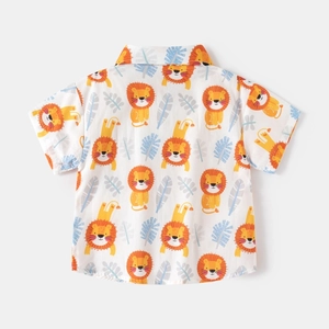 Detail of child's short-sleeve shirt back featuring cute lion and leaf digital prints