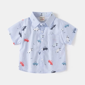 Close-up of baby short-sleeved shirt with cute colorful car prints and small chest pocket