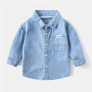 Classic light blue cotton denim shirt for boys featuring a front pocket and button closure