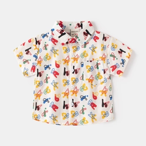 Kids short sleeve shirt with colorful graffiti patterns on white base, chest pocket detail