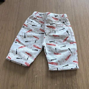 Toddler boy white five-point shorts with red and black bottle print and elastic waist