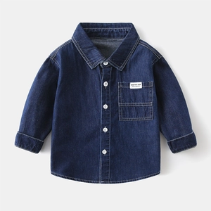 Boy's classic dark blue long sleeve denim shirt with pocket and white buttons