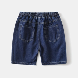 Detail view of deep blue denim shorts featuring elastic waist and dual back pockets