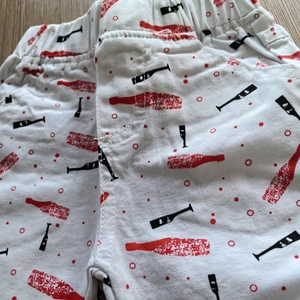 White cotton boys' shorts with all-over nautical bottle and paddle print and elastic waist