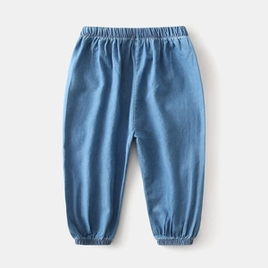 Close-up of kids light blue denim jogger pants with elastic waist and cuffed hems