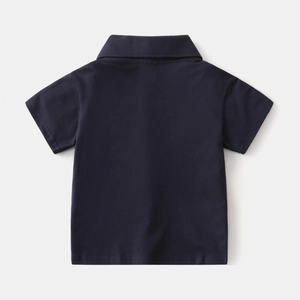 Flat lay back view of navy blue boys cotton polo shirt with neat stitching details