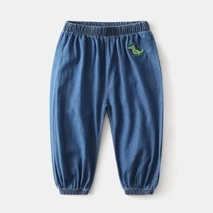 Detail of kids light blue denim mosquito pants with cute dinosaur embroidery and elastic waist