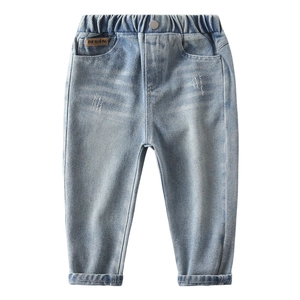Kids light blue washed denim pants with elastic waist and leather patch detail