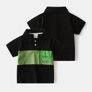 Kids black short sleeve Polo shirt with contrast green pocket and motivational text