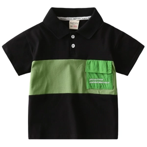Kids black and green color block polo shirt with a chest pocket and inspirational text