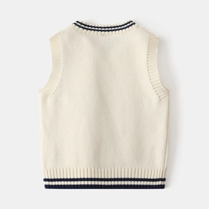Detail of cream knit vest with navy blue striped ribbing on hem and neckline