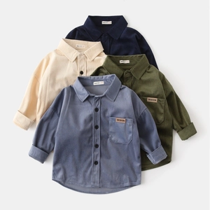 Detail of children's corduroy shirts in four colors with soft fabric texture and pocket label