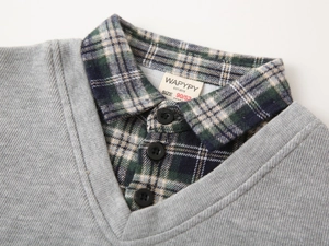 Detail of toddler faux two-piece grey knit sweater with plaid shirt collar and buttons