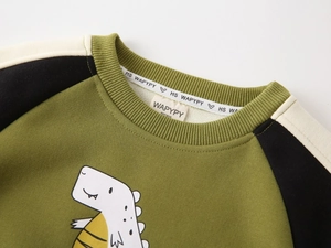 Detail of children's fleece dinosaur sweatshirt showing neckline and soft texture