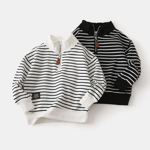 Detail view of children stripe sweatshirt with half-zipper collar and ribbed cuffs
