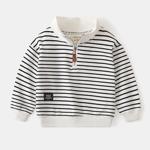 Detail of child striped sweatshirt showing half-zip mock neck and brand label