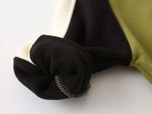 Detail view showing thick fleece lining and stitching of boys' winter sweatshirt