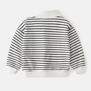 Detail of children striped sweatshirt showing ribbed cuffs and soft cotton texture